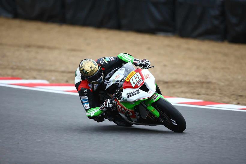 Riding with the champion's gold helmet in the National Superstock Championship in 2014