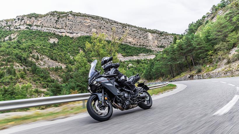 Standard 2025 Yamaha Tracer 9 ridden on the road