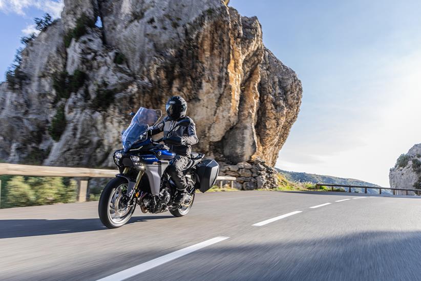 Yamaha Tracer 9 GT+ ridden on a mountain road