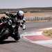 BMW M1000R cornering on track