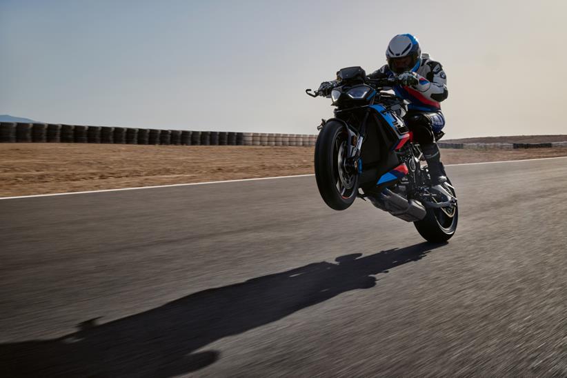 BMW M1000R wheelie on track