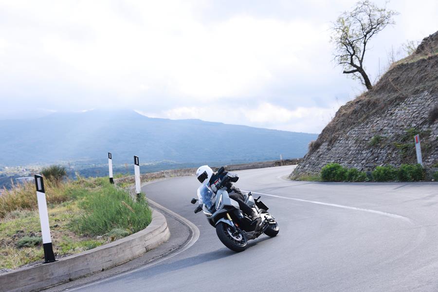 2025-on Honda X-ADV 750 riding a sweeping corner