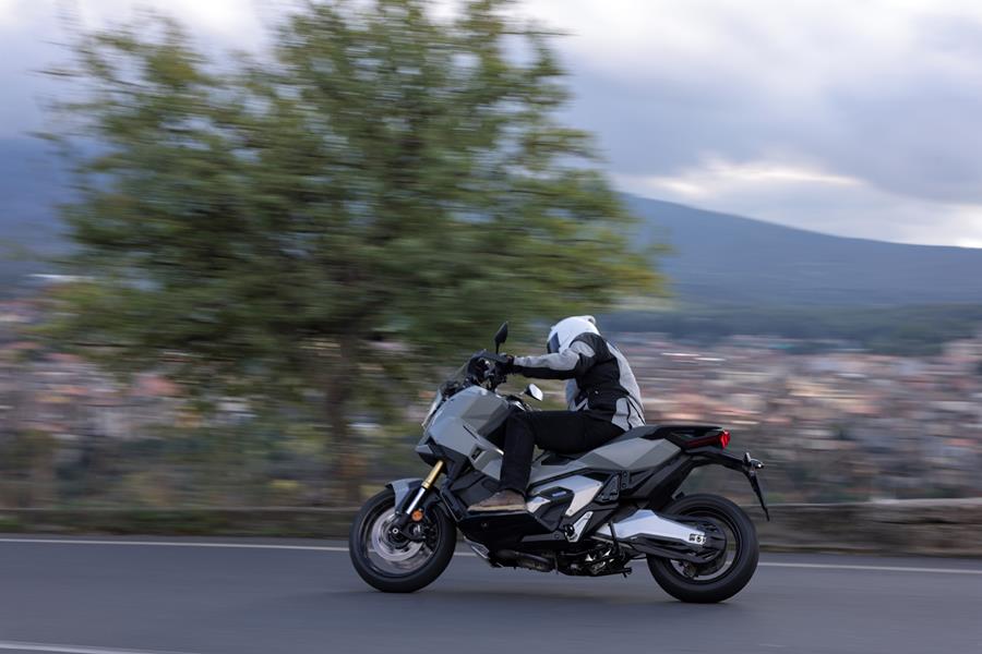 2025-on Honda X-ADV 750 racing down a mountain pass