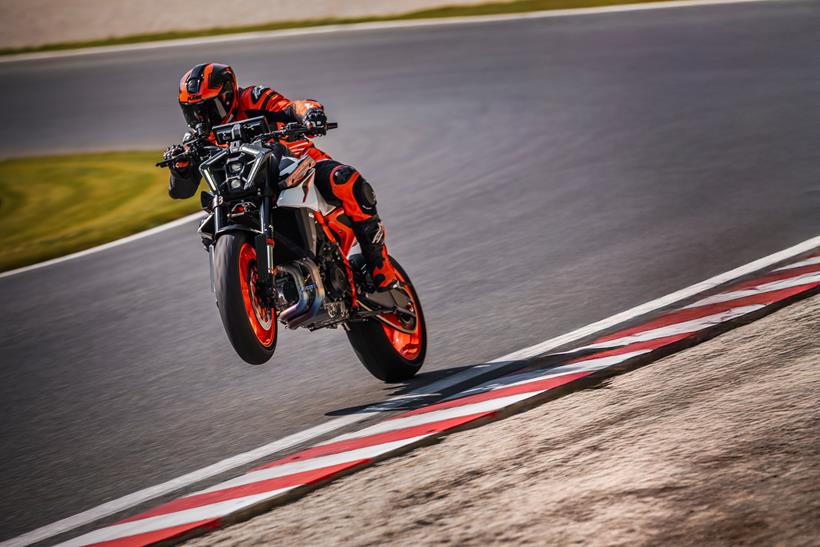 Pulling a wheelie out of a corner on the KTM 990 Duke R