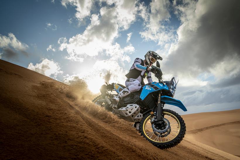 2025 Yamaha Ténéré 700 Rally riding down a sand dune