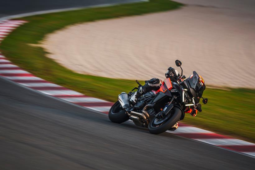 KTM 1390 Super Duke GT cornering on track