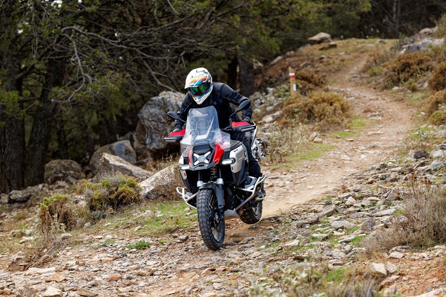 2024-on BMW R1300GS Adventure ASA coming down a trail