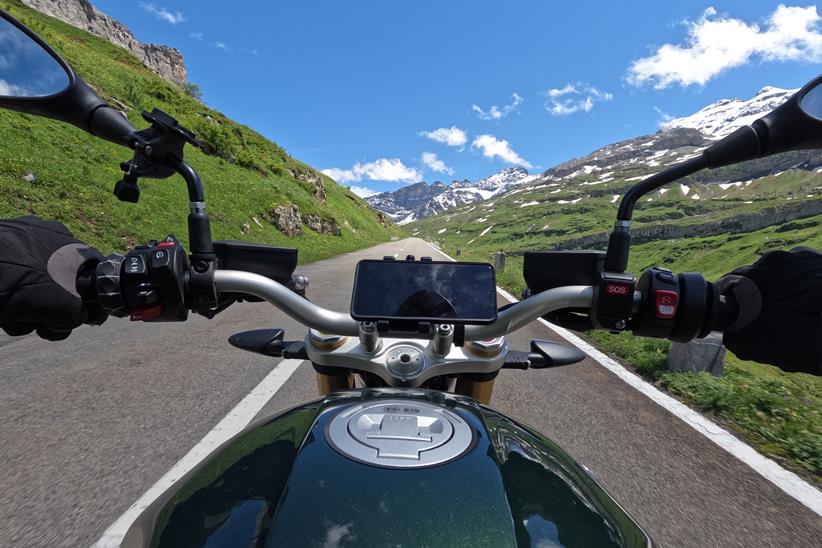 BMW R12 nineT on board riding shot in the Alps