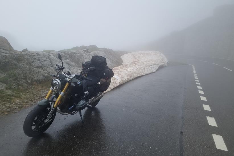 BMW R12 nineT parked in the fog