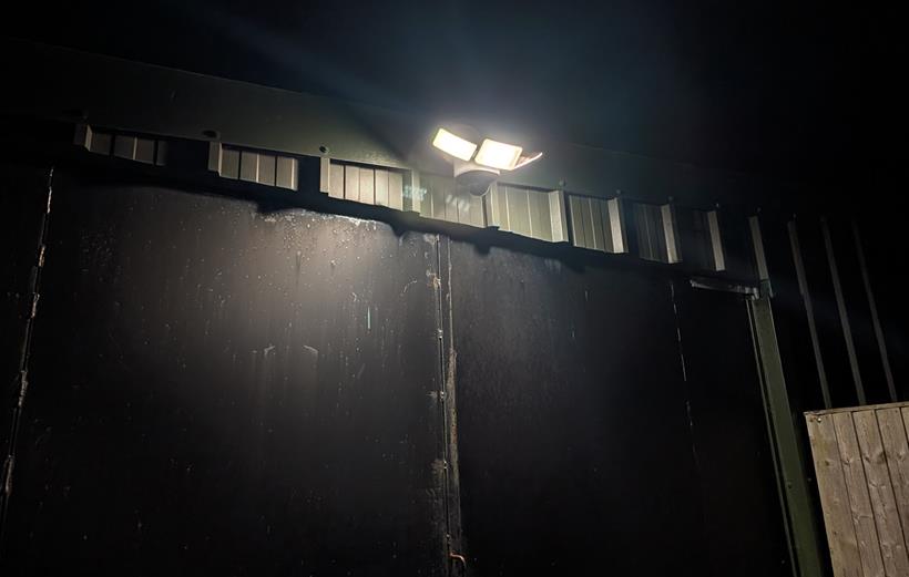 Floodlight camera at night