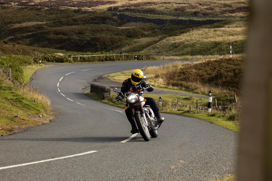 2025-on Royal Enfield Classic 650 riding through a twisty country road