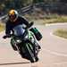 2025-on Kawasaki Ninja 1100SX SE riding down a road