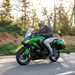 2025-on Kawasaki Ninja 1100SX cruising down a road