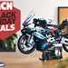 A LEGO Technic model of the BMW M1000RR, with MCN's 'Black Friday Deals' logo