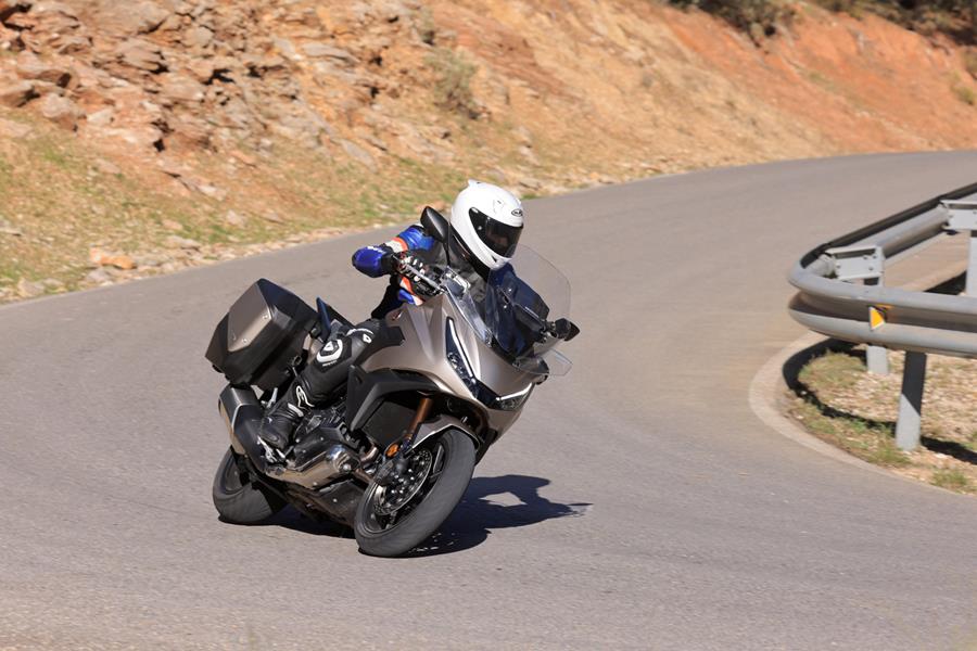 2025-on Honda NT1100 leaning into a left hand bend