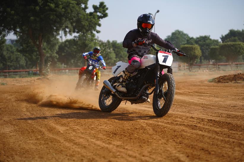 Royal Enfield FT450 sliding through a turn