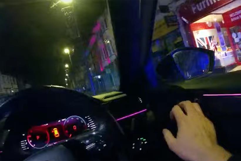 Police officer exiting a patrol car