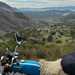 Honda SS50 overlooking mountains