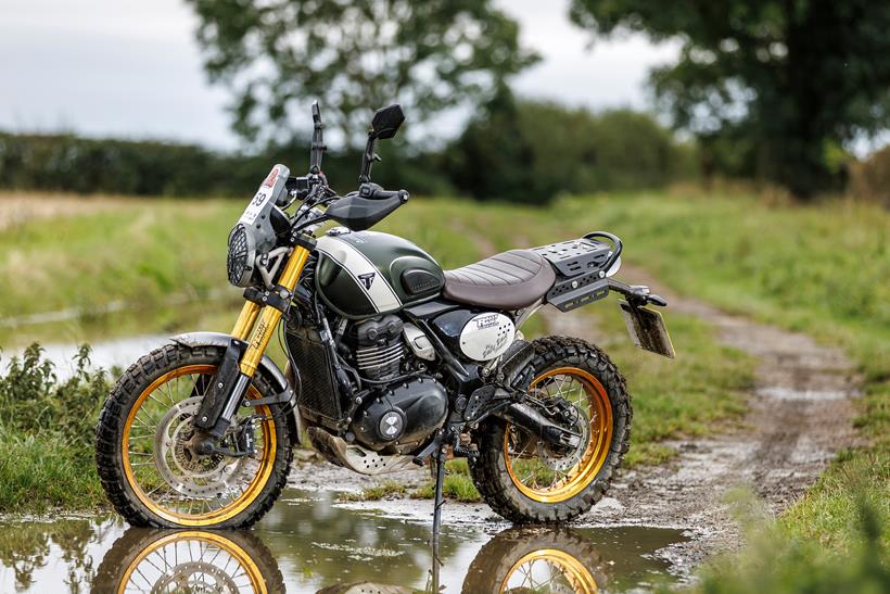 Rally Raid Triumph Scrambler 400 X in a puddle