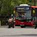 Motorcycles in front of bus