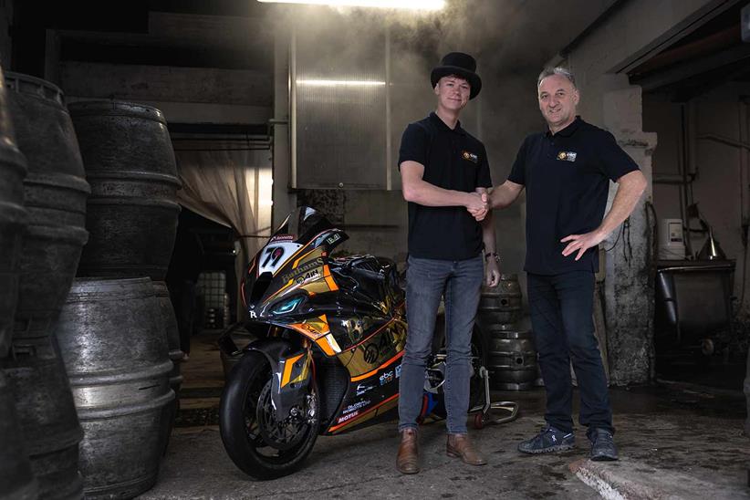 Storm Stacey and Michael Rutter with the Bathams AJN Racing BMW M1000 RR