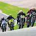 Group of racers on track aboard Honda CB500s