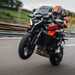 Jeremy McWilliams pulling a wheelie aboard the new KTM 1390 Super Duke GT