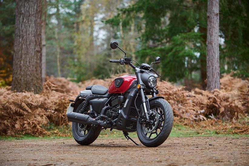 Red AJS Sedona 250 parked in a layby