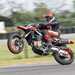 Ducati Hypermotard 698 Mono pulling a wheelie