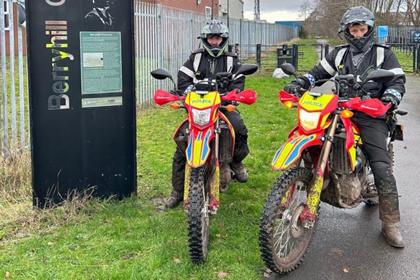 Two members of the Police off-road motorcycle team aboard Honda CRF300Ls