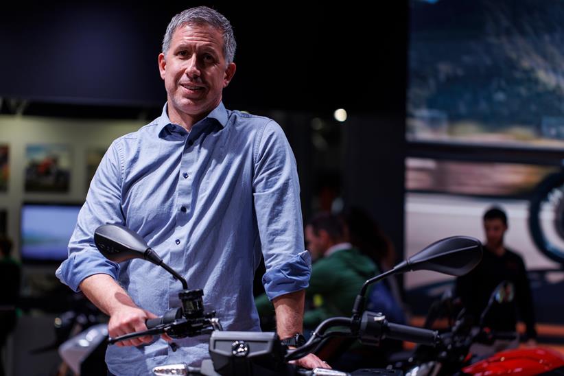 CEO of Zero Motorcycles, Sam Paschel with a bike