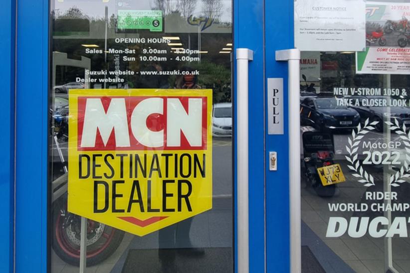 MCN destination dealer sign on door