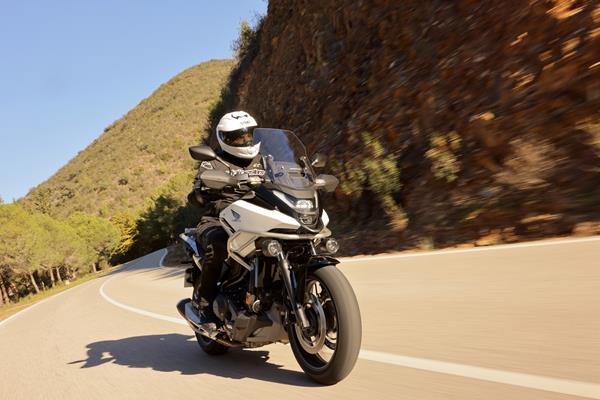 2025-on Honda NC750X riding down the road