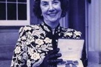 Gwen Crellin, popular figure at TT receiving her MBE