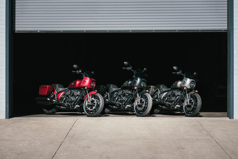 2025 Indian Sport Chief RT models parked outside a garage