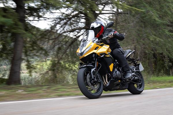 2025-on Triumph Tiger Sport 800 riding through a forest