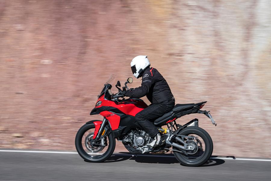 2025-on Ducati Multistrada V2 S riding with a canyon back drop