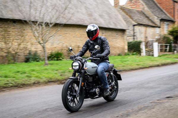 2025-on Honda GB350S riding through a country village