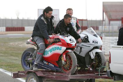 Haslam and Harris both crashed on oil dropped by a Spanish rider