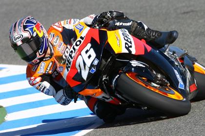 Honda man Pedrosa edged out Yamaha's Rossi to pole spot