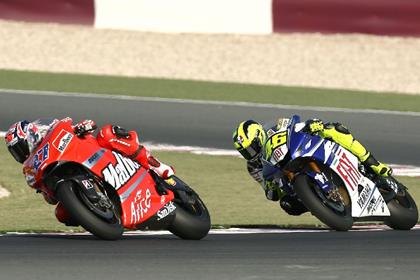 Stoner is happy to be contending with the likes of Rossi for the title