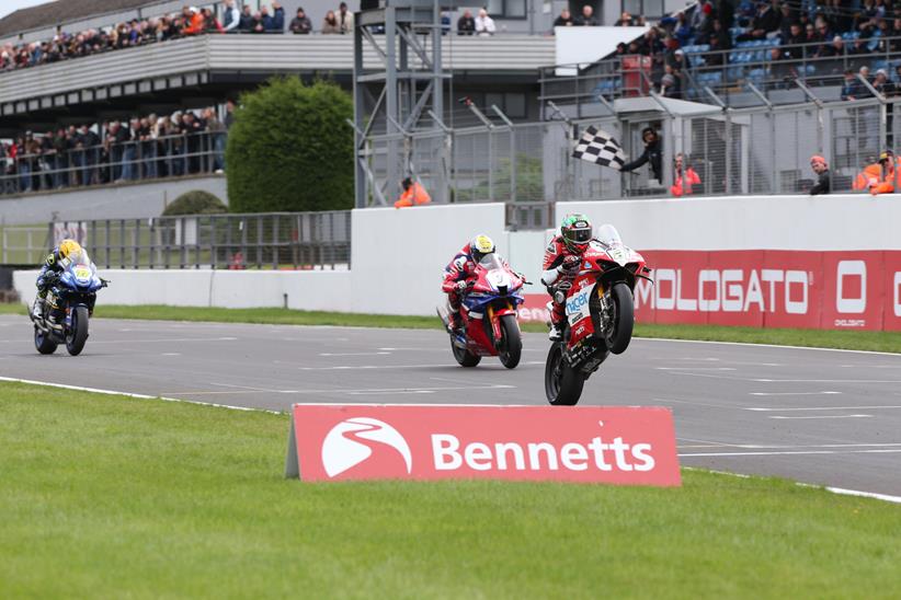 Glenn Irwin pulls a wheelie