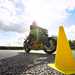 Motorcycle passes a cone during training