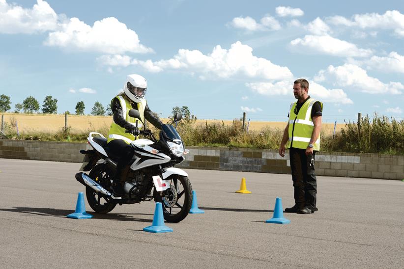 Honda CBF125 rider under instruction