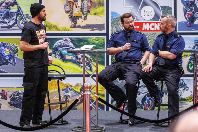 Ben Clarke talks bike security with the Met Police at the Devitt Insurance MCN London Motorcycle Show