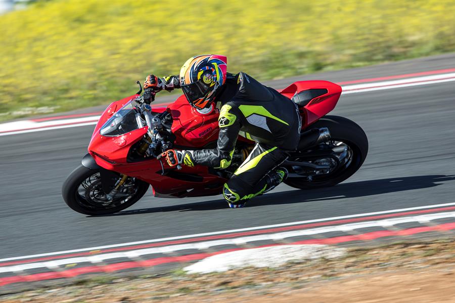 2025-on Ducati Panigale V2 S leaning into a left hand bend 