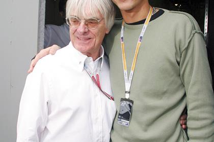 Ecclestone, seen here with Rossi in 2004, says the Fiat Yamaha rider would have been mad to leave MotoGP