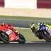 Stoner withstands the pressure from Rossi to win again