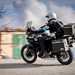 2025-on CF Moto 700MT - riding past with full panniers