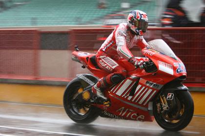 Casey Stoner played the weather perfectly to secure pole